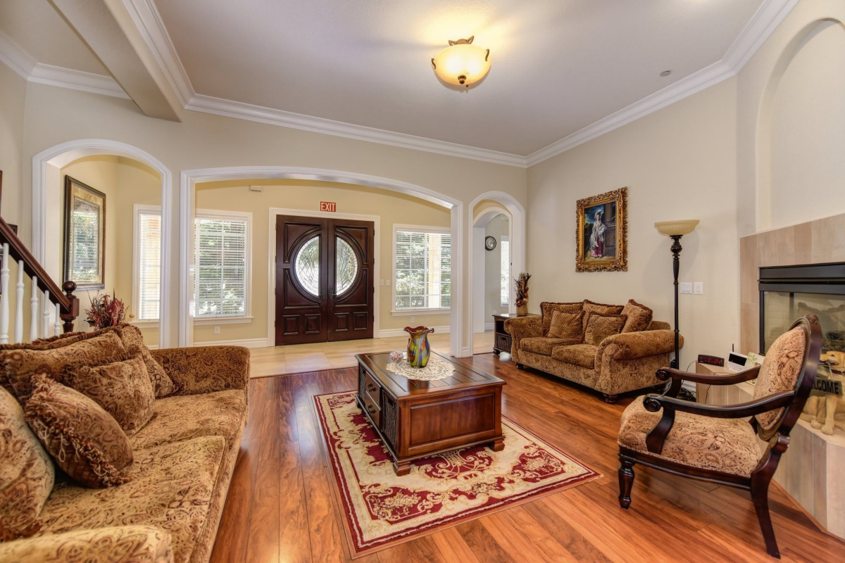 A cozy living room with elegant furnishings and a warm ambiance.