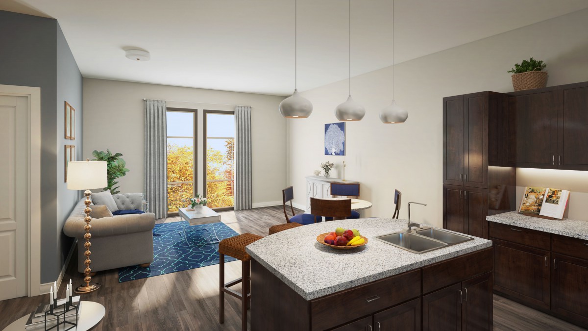 A modern open-plan apartment featuring a kitchen island, dining area, and cozy living space with large windows.