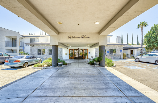 Entrance view of a commercial building with clear signage.