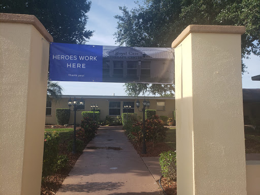 Entrance to a residential or community area featuring a banner.