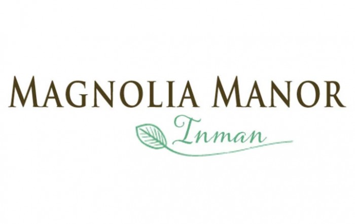 Logo featuring the words 'Magnolia Manor Inman' with a leaf design.
