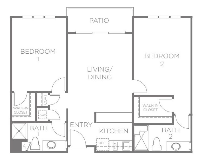 A two-bedroom apartment floor plan featuring a kitchen, living/dining area, patio, and two bathrooms.