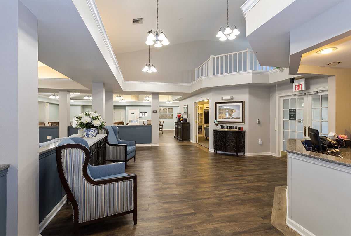Elegant lobby area with seating and reception desk.