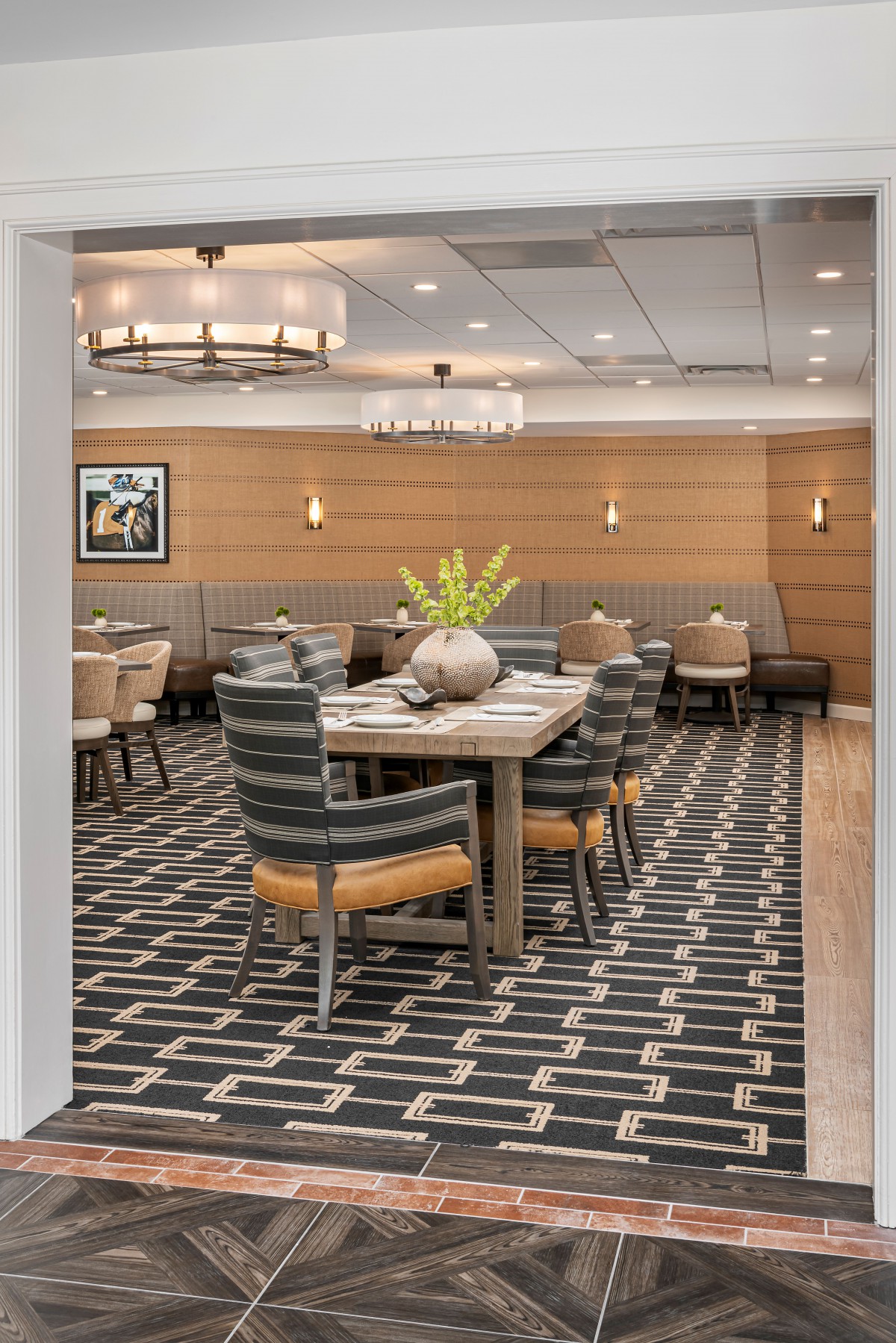 A modern dining room with stylish decor and comfortable seating.