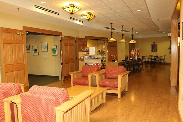 A cozy lobby area with seating and warm lighting.