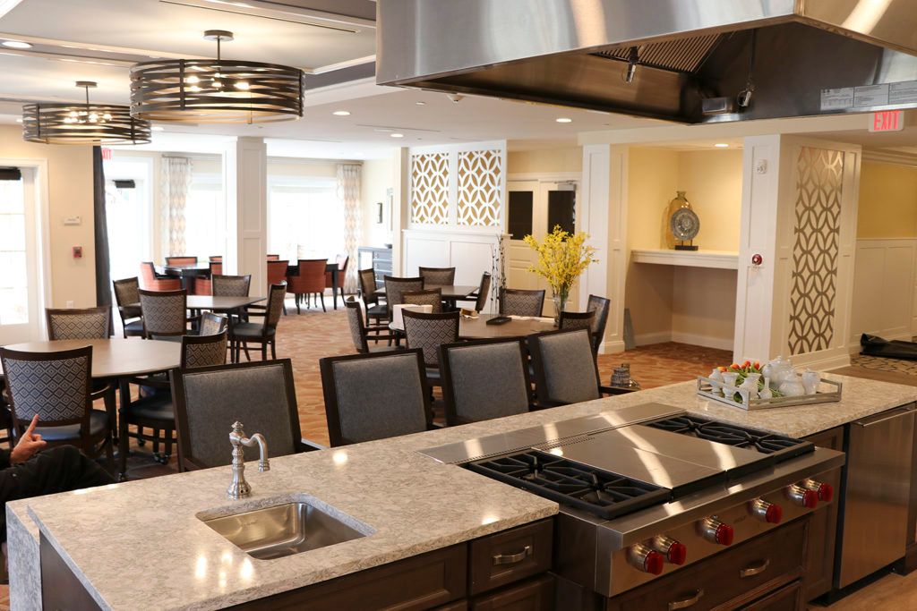 A modern kitchen and dining area with a spacious and elegant design.