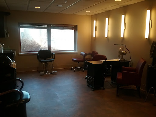 A quiet and organized office space with modern furniture and ample natural light.