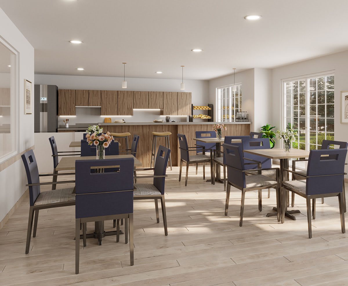 A modern dining room with a view of the kitchen, featuring sleek tables and chairs, ample natural light, and wooden flooring.