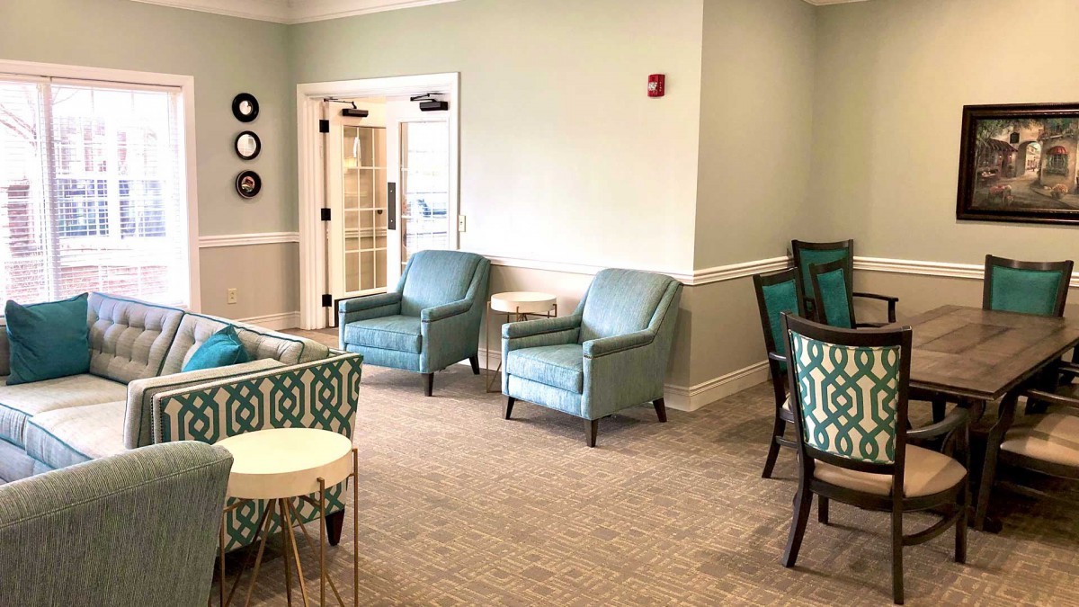 A modern living room with comfortable seating and tasteful decor.