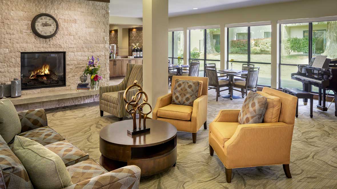 A modern living room with comfortable seating and natural lighting.