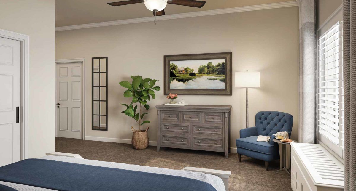 A cozy bedroom interior featuring a dresser, an armchair, a potted plant, and wall artwork under soft lighting.