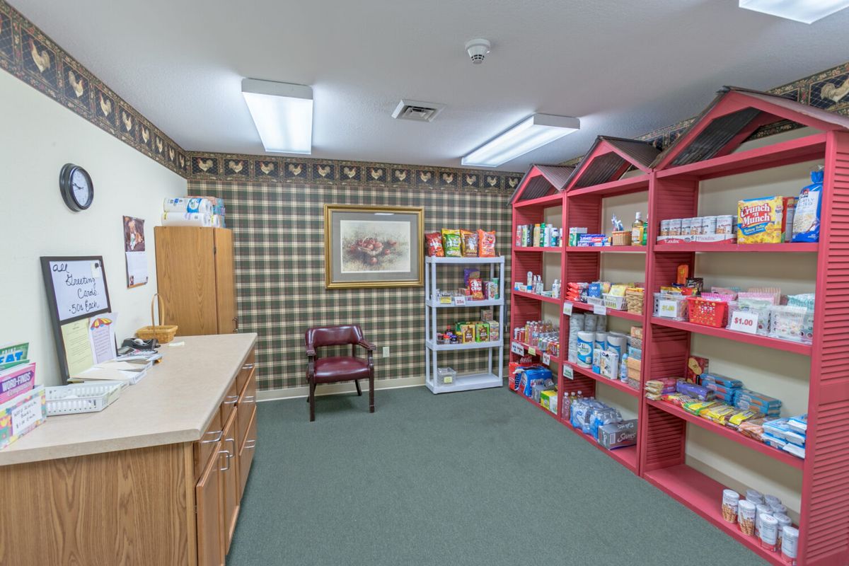 A cozy retail space featuring shelves filled with children's products and toys.