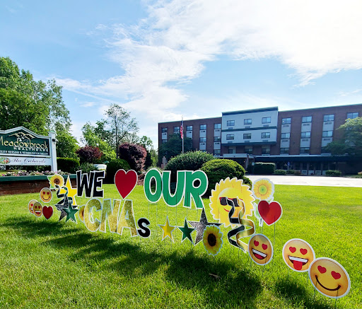 A vibrant display of appreciation with colorful decorations on the lawn.