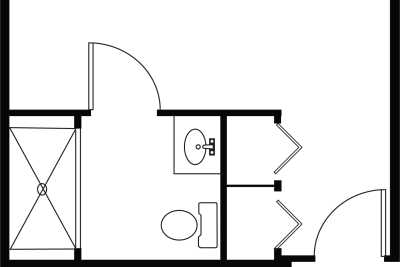 A floor plan showing the layout of a small bathroom, including a toilet and sink.