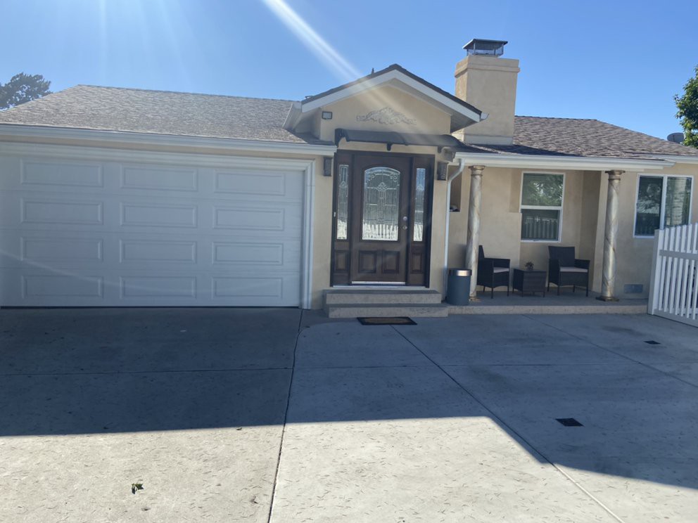A single-story residential home with a garage and driveway.