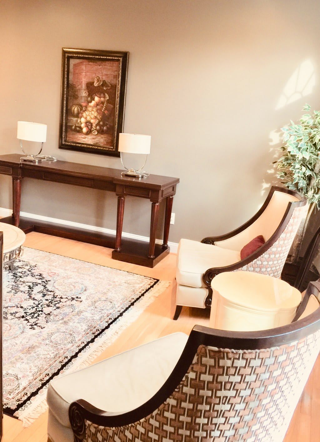 A well-appointed living room with elegant furniture and decor.