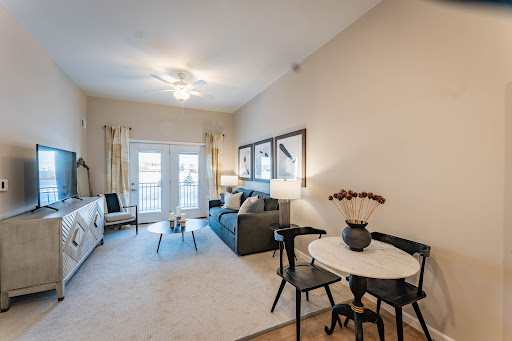 A beautifully designed modern living room featuring a comfortable seating area and stylish decor.