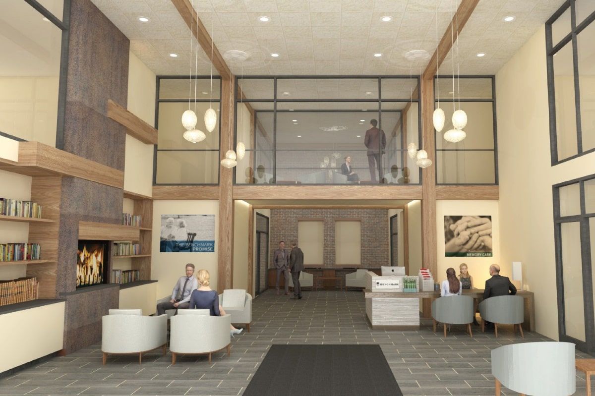 A modern office lobby with a reception desk, waiting area, and stylish decor.