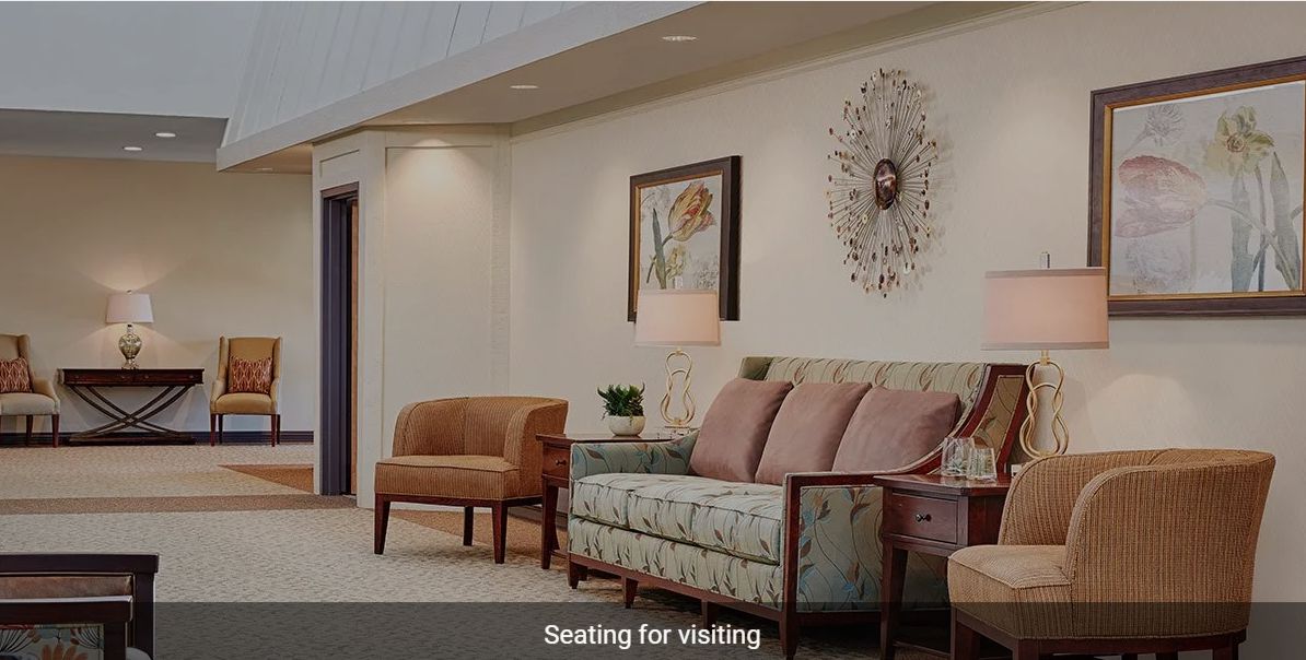 A well-decorated waiting room with comfortable seating.