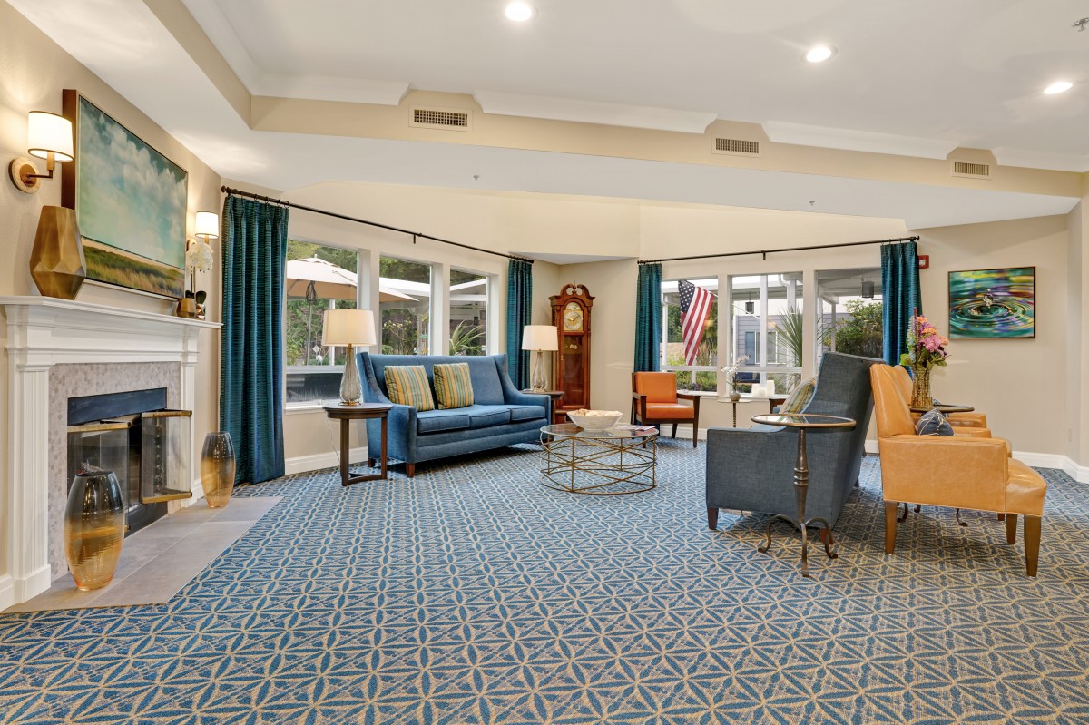 A cozy living room with comfortable seating and elegant decor.