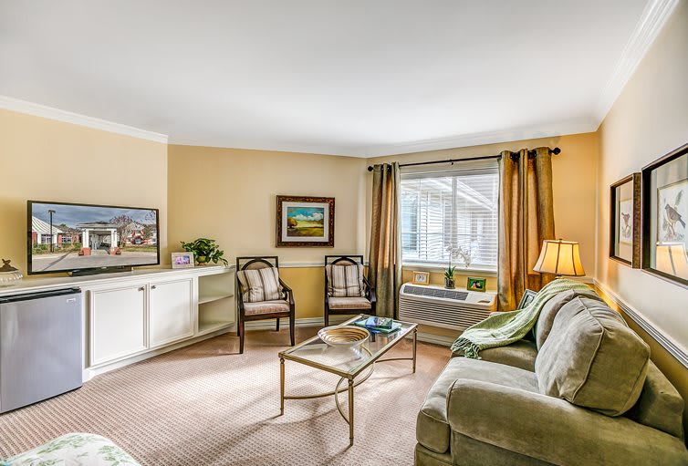 A cozy living room with comfortable seating and tasteful decor.