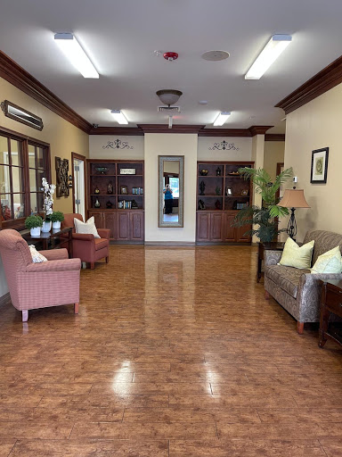 A welcoming lobby featuring comfortable seating and warm decor.