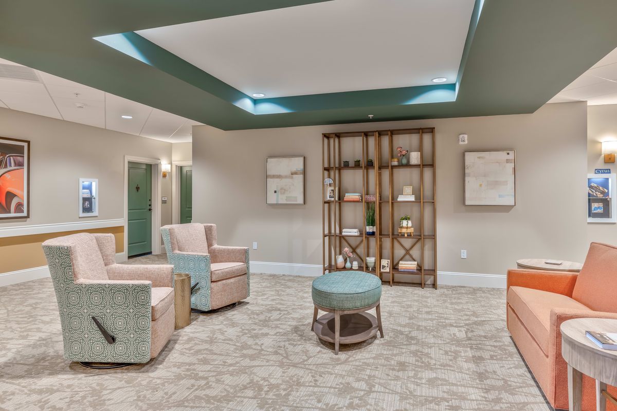 A modern lounge area with comfortable seating and stylish decor.