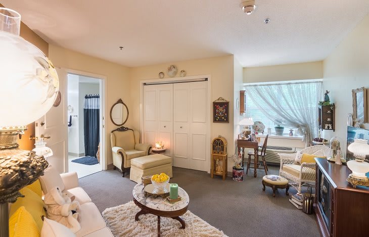 Cozy living room with comfortable seating and natural light.
