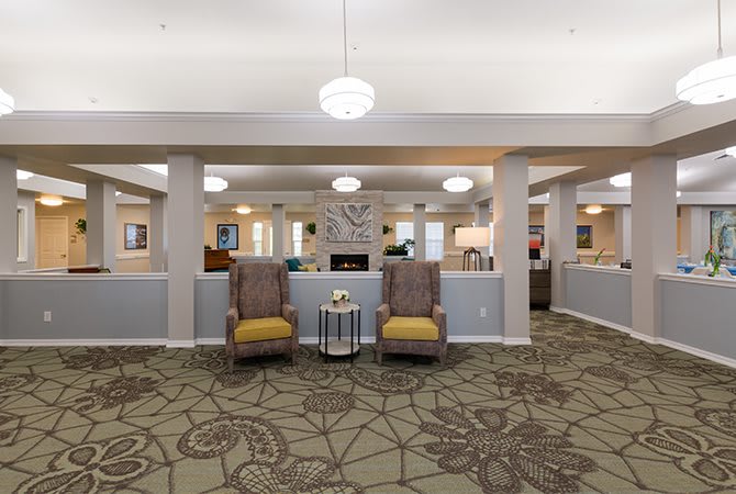 A well-decorated lobby area featuring comfortable seating and elegant lighting.