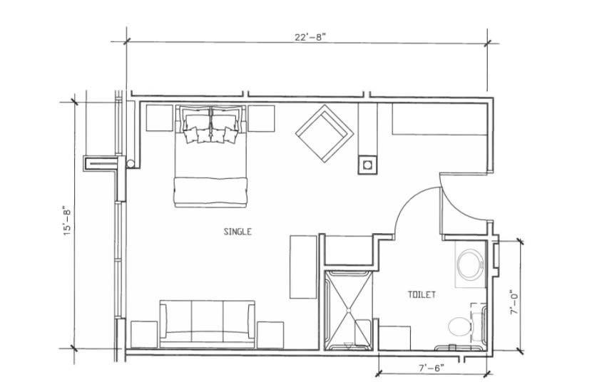 A detailed floor plan of a room featuring a bed, sitting area, and bathroom.