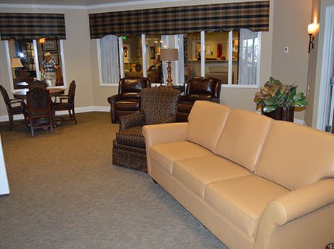 A spacious living room with comfortable seating and modern decor.