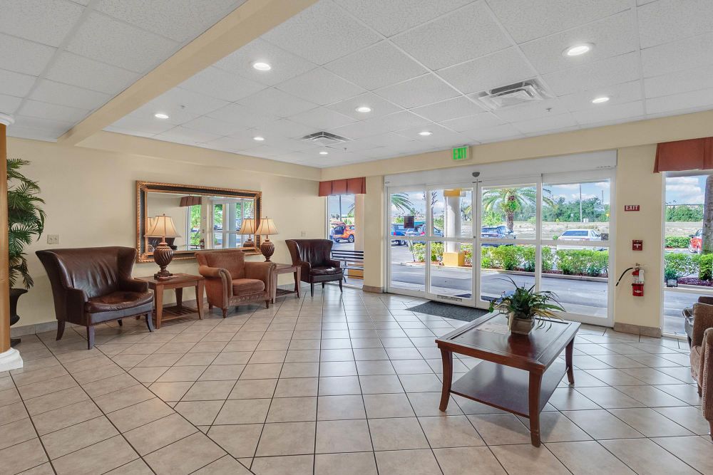 A spacious lobby with comfortable seating and modern decor.