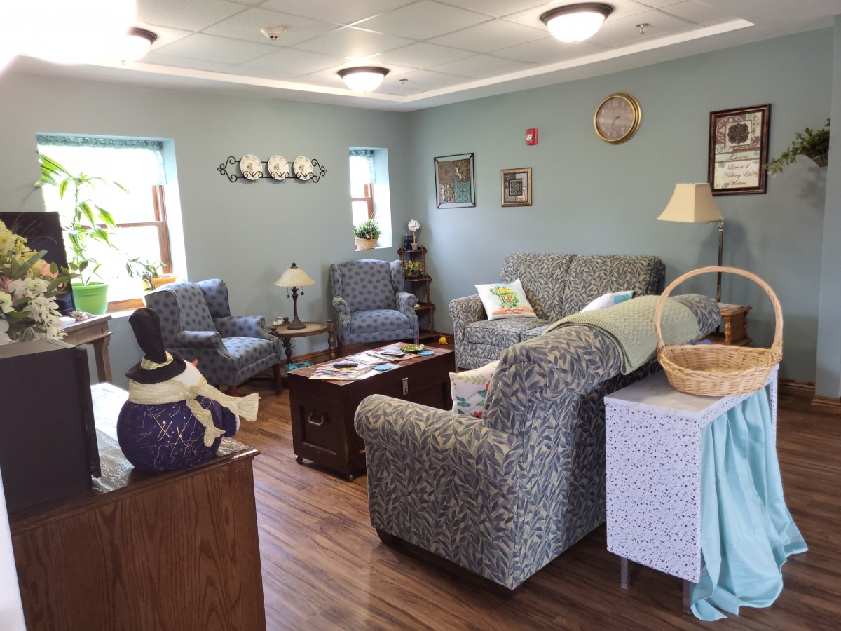 A cozy living room with comfortable seating and tasteful decor.