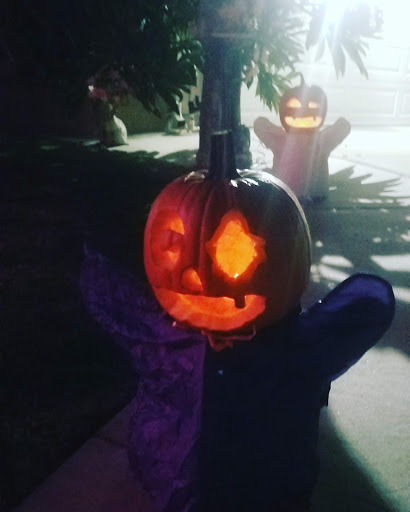 A whimsical jack-o'-lantern glowing against a spooky backdrop, perfect for Halloween festivities.
