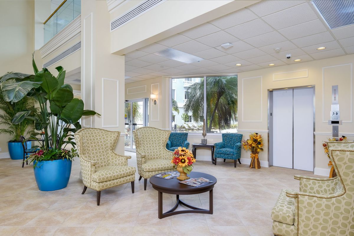 A modern lobby with elegant seating and large windows.