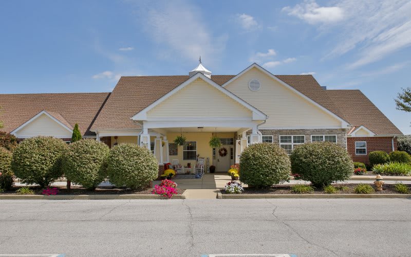 A well-maintained residential building with a welcoming entrance and landscaped surroundings.