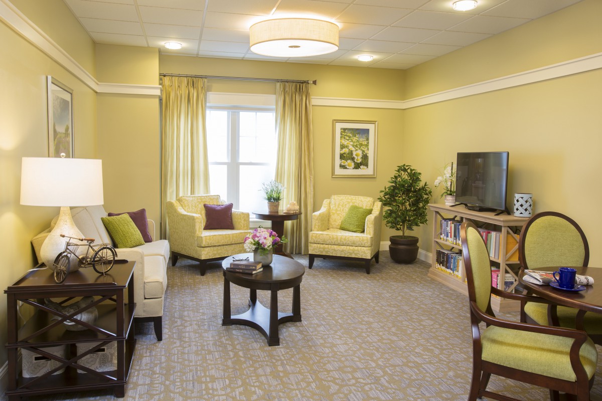 A cozy living room with neutral colors and comfortable seating.
