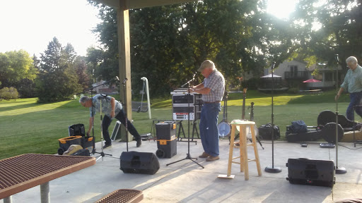 Local musicians performing at an outdoor event.