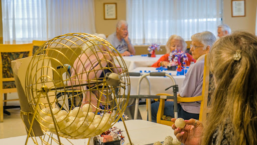 Residents enjoying a lively game of bingo at a community center.