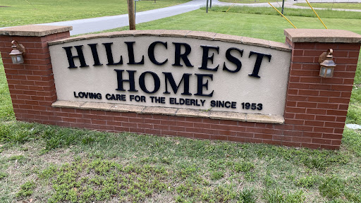 A welcoming sign for Hillcrest Home, dedicated to providing care for the elderly since 1953.