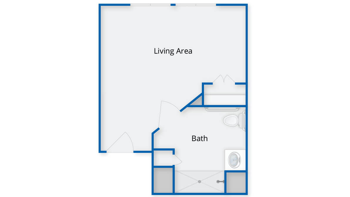 A blueprint floor plan showing a living area and a bathroom.