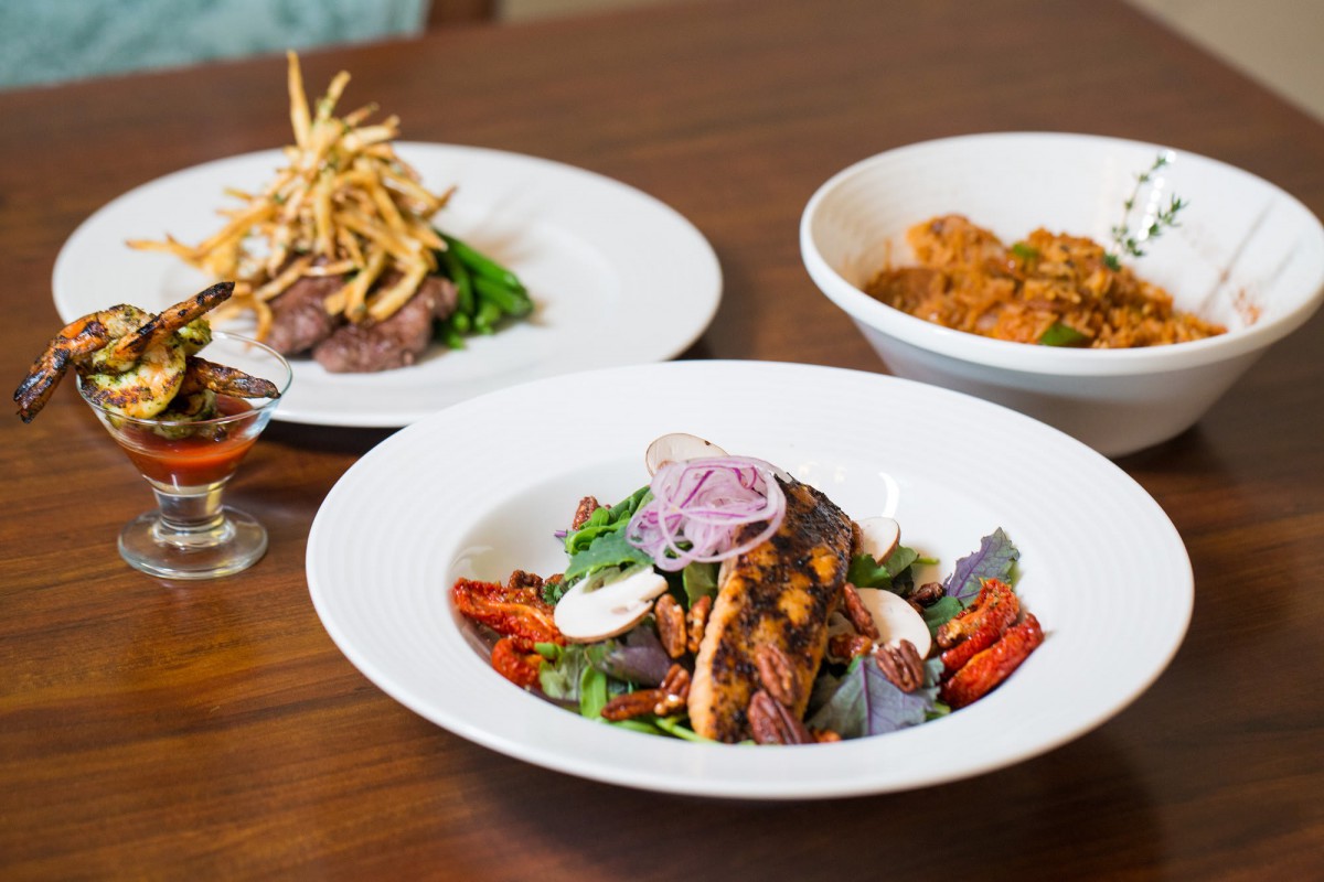 A delicious assortment of gourmet dishes elegantly presented on a dining table.