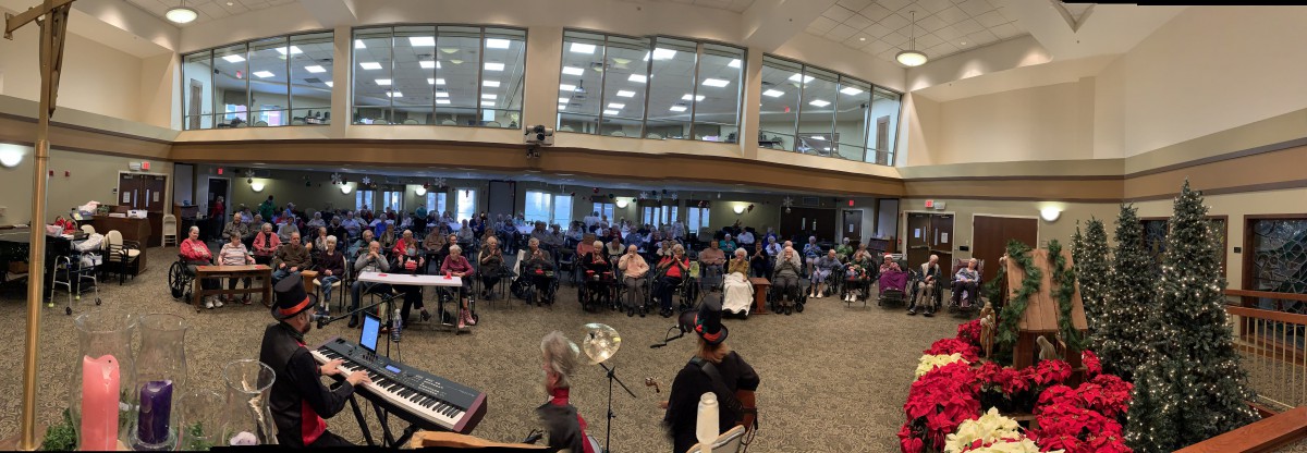 A live performance with a full audience in an indoor venue.