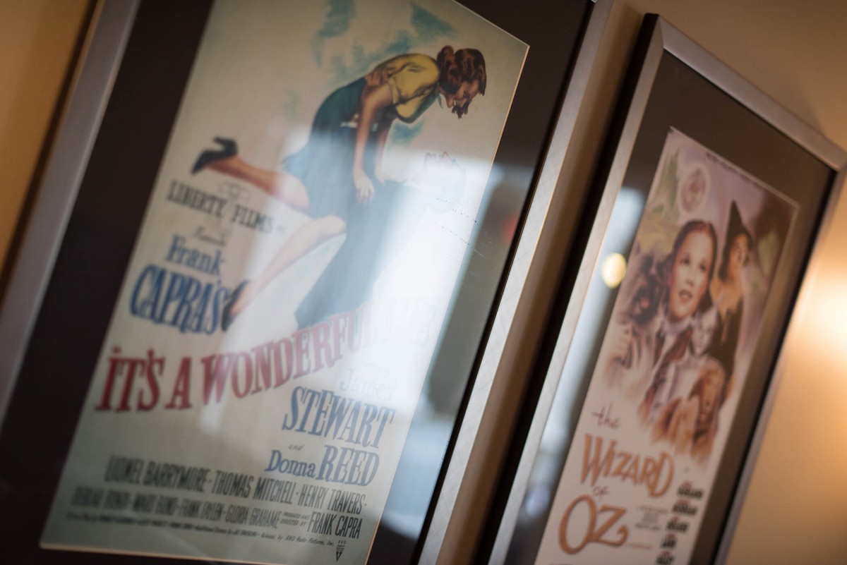 Framed classic movie posters on display.