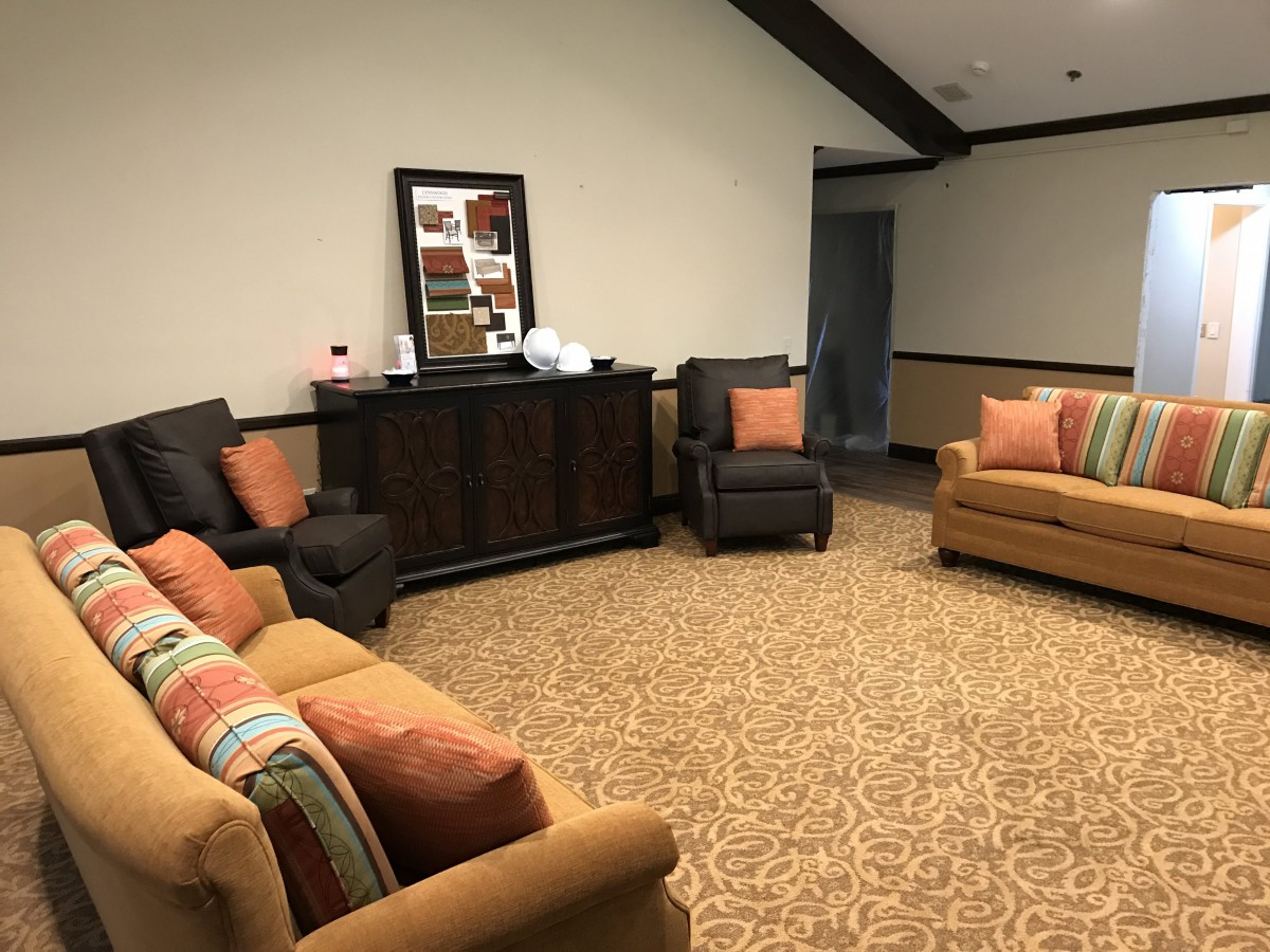 A cozy living room with comfortable seating and warm decor.