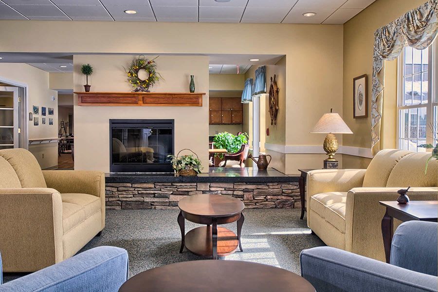 Cozy living room with a fireplace and comfortable seating.