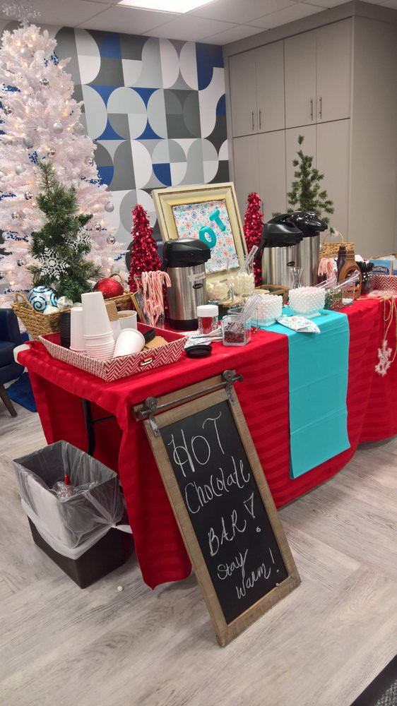 A festive hot chocolate station with holiday decorations and a welcoming atmosphere.