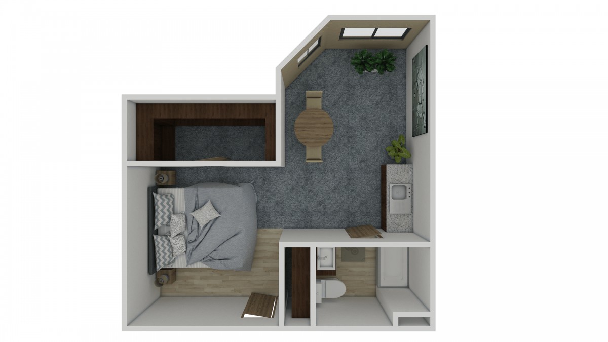 Compact apartment floor plan featuring a bedroom, kitchen area, and bathroom.