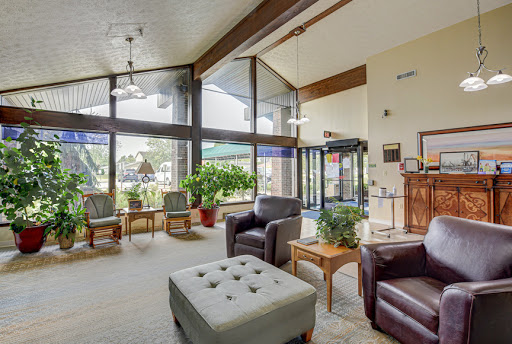 A welcoming lobby featuring comfortable seating and plenty of natural light.