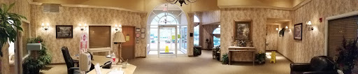 A spacious and inviting lobby with a grand entrance and elegant decor.